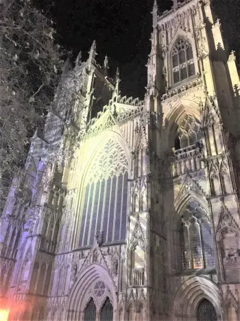 The front of York Minster lit during the night